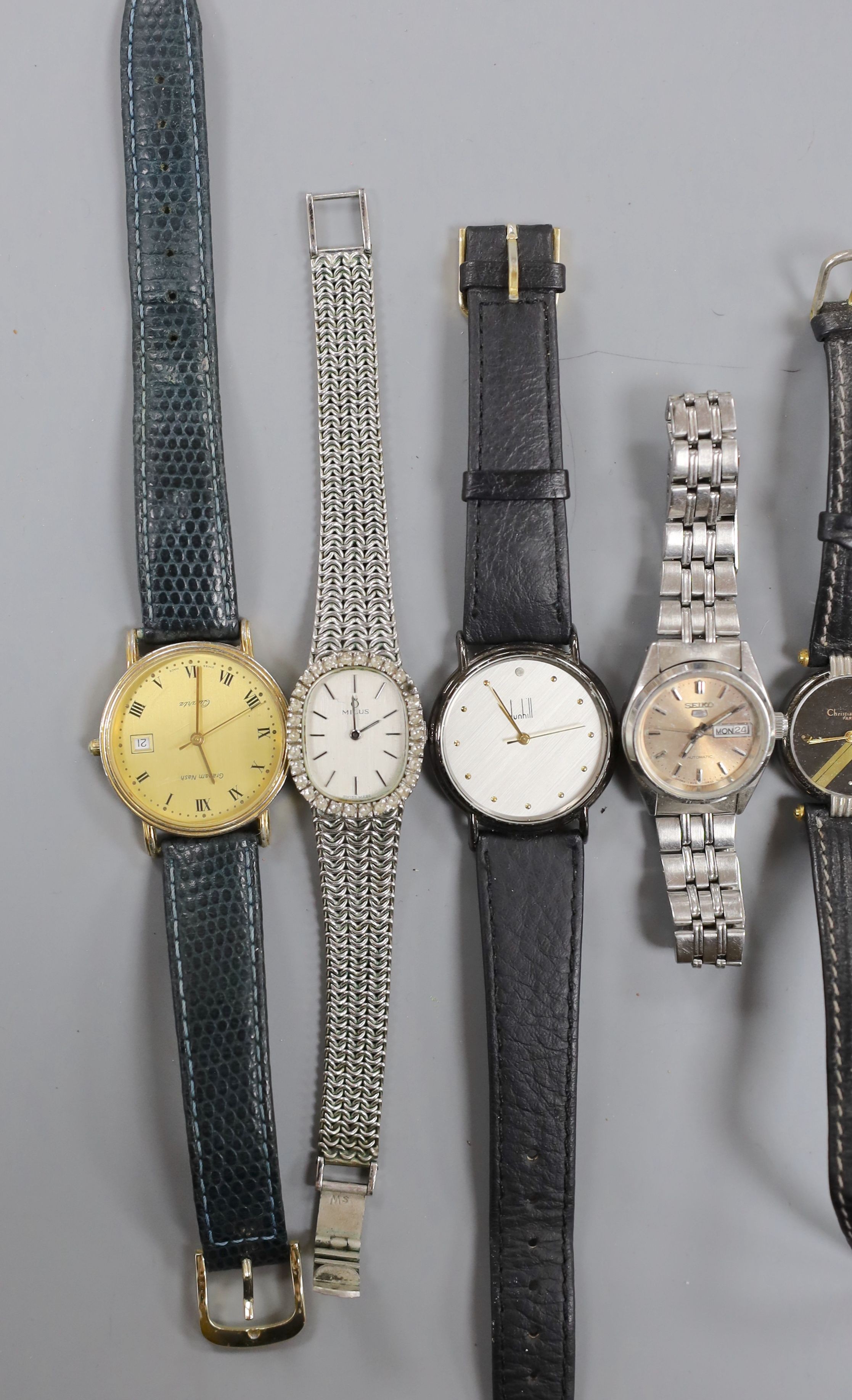 A Dunhill Swiss quartz wrist watch and nine other assorted lady's and gentleman's modern wrist watches including Seiko.